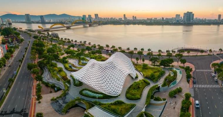 scenic view of da nang city with dragon bridge and modern riverside pavilion
